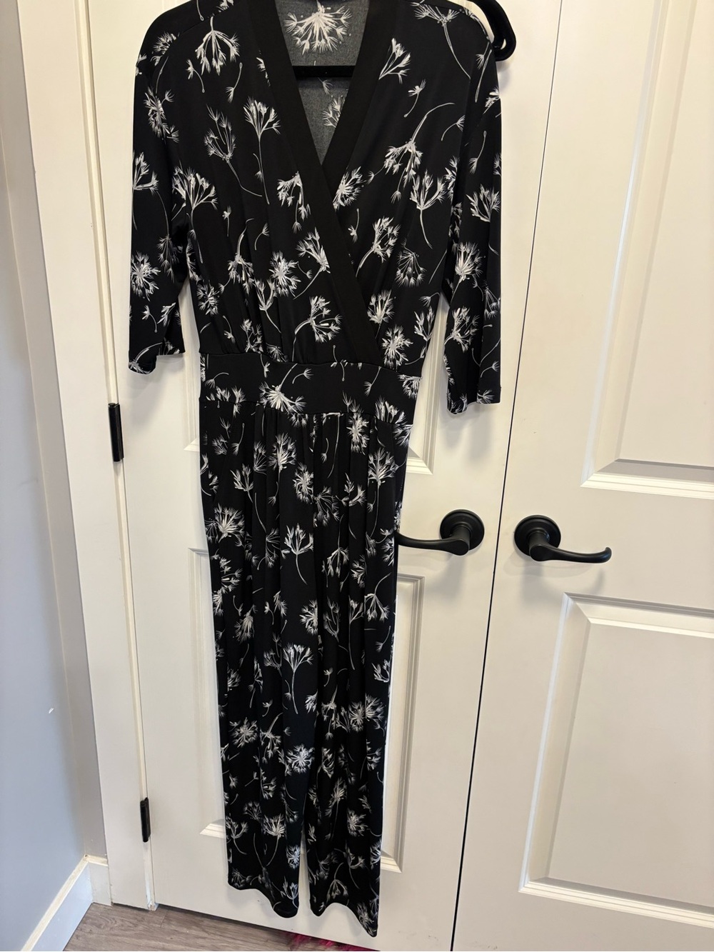 Black Floral Wrap Jumpsuit. 20 ptp pls stretch